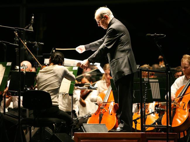 Italian composer Ennio Morricone conducting Adelaide Symphony Orchestra at Elder Park in 2012.