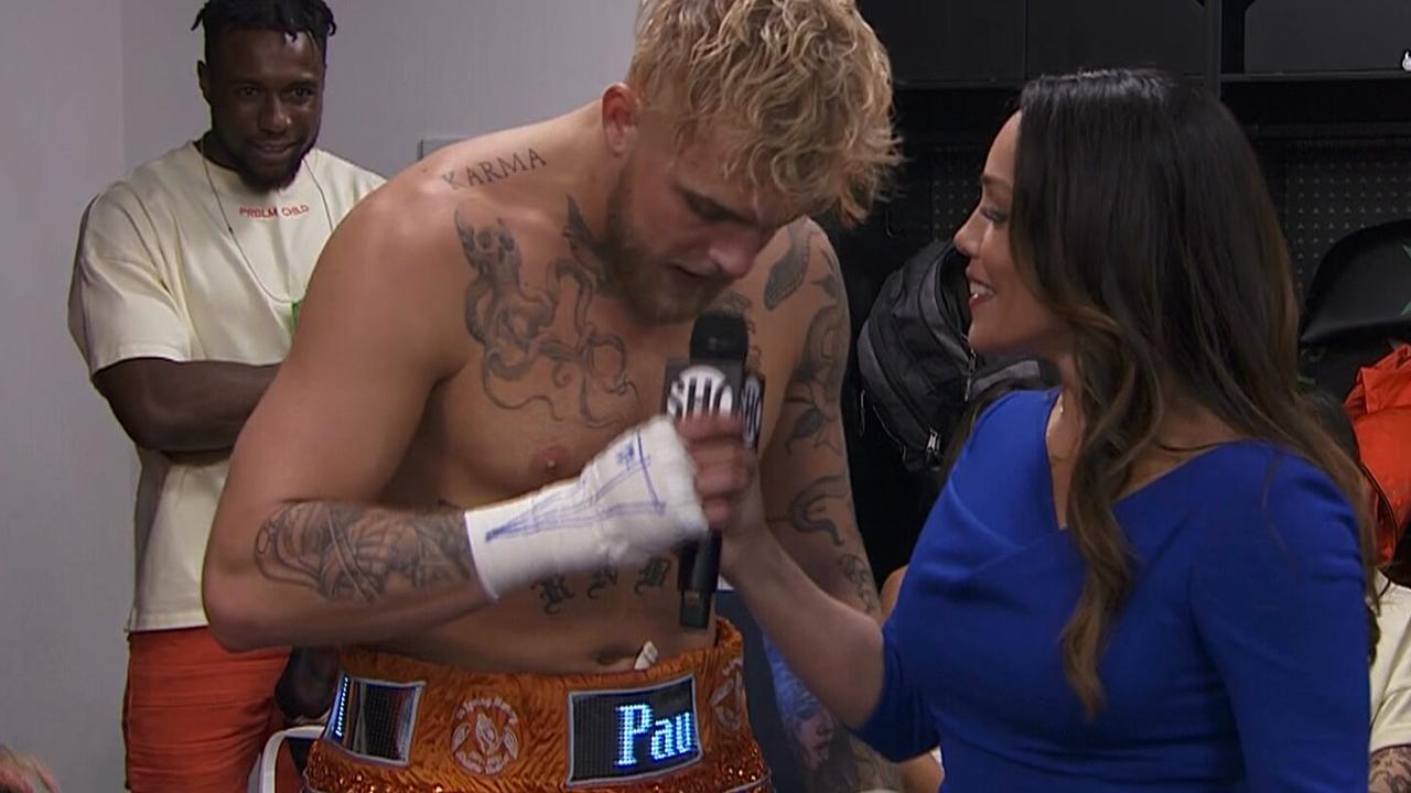 Jake Paul shows off his LCD display shorts.