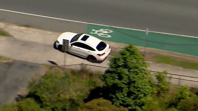 Police pursue a luxury vehicle across Ipswich streets. Picture: Channel 9