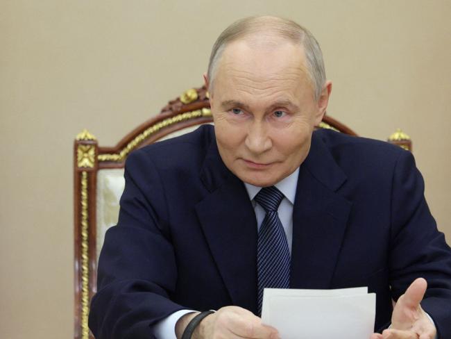 In this pool photograph distributed by the Russian state agency Sputnik, Russia's President Vladimir Putin meets with military chiefs in Moscow on November 22, 2024. Russian President Vladimir Putin said on November 22, 2024 that Moscow would carry out more tests of the hypersonic Oreshnik ballistic missile in 
