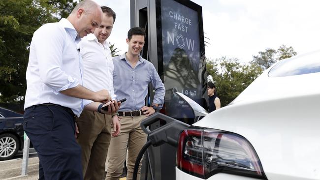 Former Treasurer and Minister for Energy Matt Kean plugging in his electric vehicle with Jolt chief executive Doug McNamee. Picture: Jonathan Ng