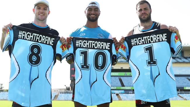 Chad Townsend, Ronaldo Mulitalo and Wade Graham earlier this year show off their NRL Nines jersey which were dedicated to Fine Kula. Picture: Brett Costello