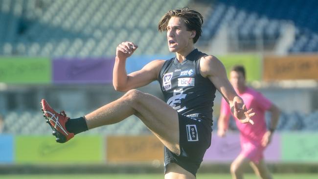 Sam Fisher kicks Northern Blues forward in the VFL. Picture: Amy Paton.