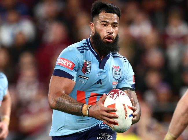 BRISBANE, AUSTRALIA - MAY 28: Payne Haas of the Blues charges forward during game one of the Men's State of Origin series between Queensland Maroons and New South Wales Blues at Suncorp Stadium on May 28, 2025 in Brisbane, Australia. (Photo by Chris Hyde/Getty Images)