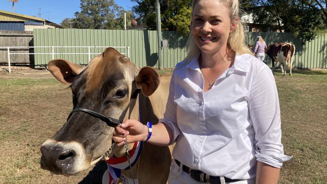 Julia Paulger with Adadale Joel Primrose, who won Supreme Cow and Supreme Udder at the 2023 Gympie Show.