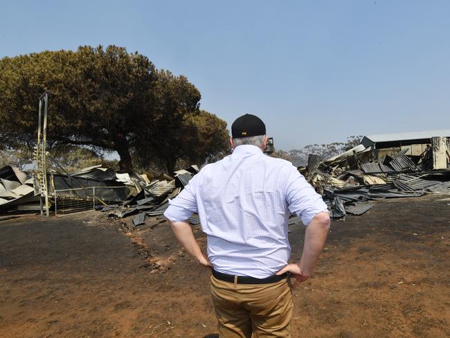 Prime Minister Scott Morrison is cozying up to the climate change warriors. Picture: AAP Image/David Mariuz