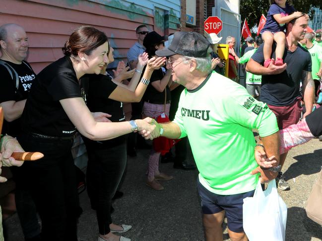 Premier Annastacia Palaszczuk with CFMEU members in the Labour Day march through Brisbane. Pic Darren England