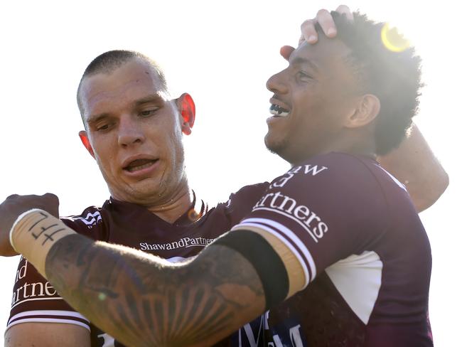 BRISBANE, AUSTRALIA - AUGUST 29:  Jason Saab (R) of the Sea Eagles celebrates with Tom Trbojevic of the Sea Eagles after scoring a try, which was later disallowed by the video referee during the round 24 NRL match between the Manly Sea Eagles and the Canterbury Bulldogs at Moreton Daily Stadium on August 29, 2021, in Brisbane, Australia. (Photo by Albert Perez/Getty Images)