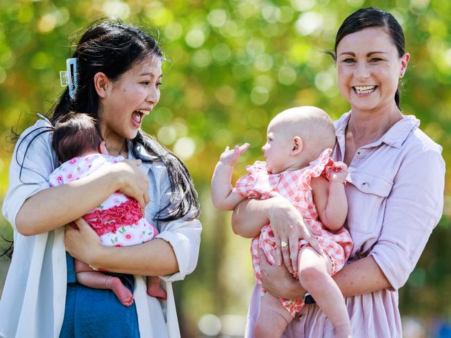 21/02/2025 Nhi Tran with her daughter Kelsi (3 weeks) and Stacey Ellery with her daughter Edie (8 months) at Malahang Reserve in Heidelberg West. Nhi Tran and Stacey Ellery have led a study into the potential health benefits of creatine supplements before and during pregnancy at the Hudson Institute. Aaron Francis / The Australian