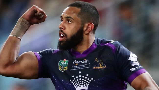 Josh Addo-Carr of the Storm celebrates scoring a try.