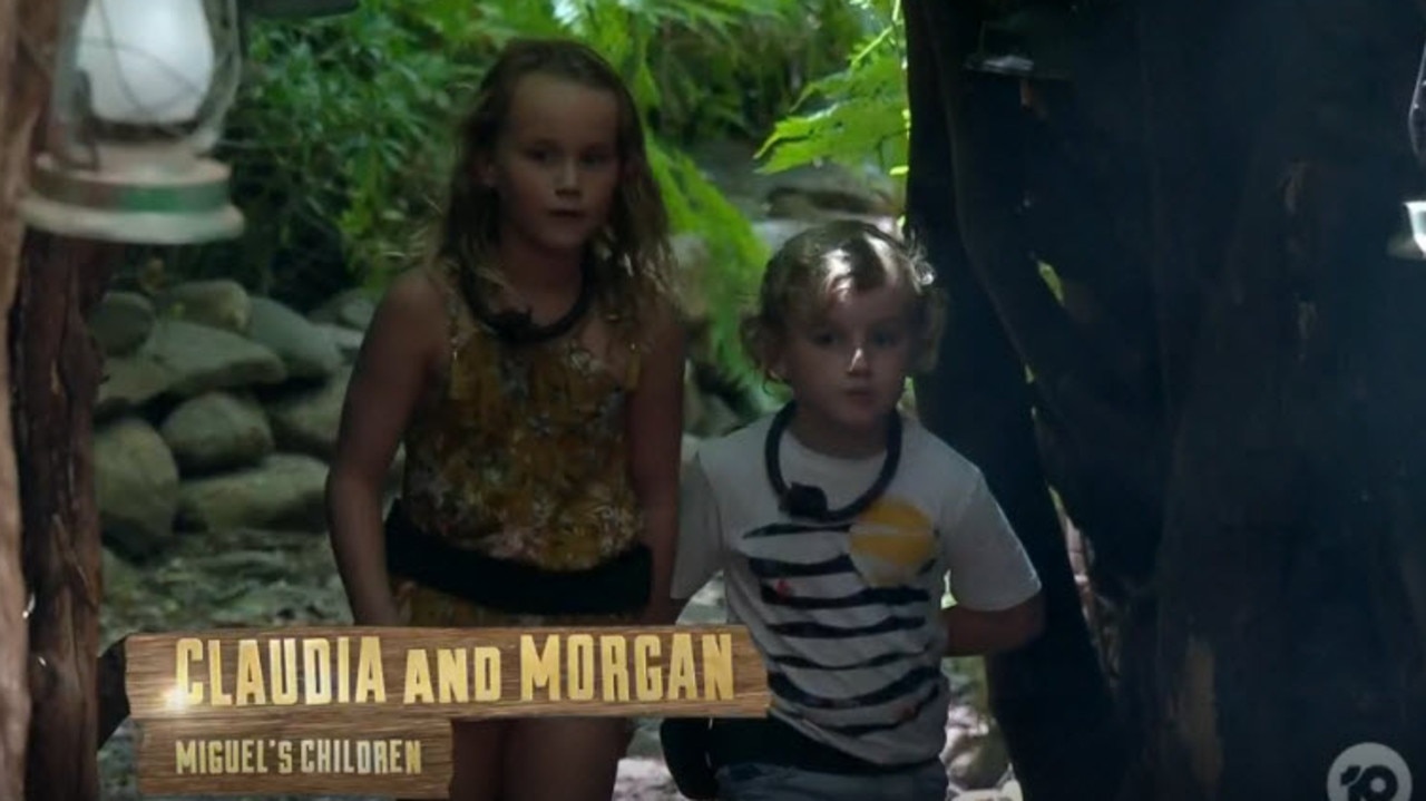 Miguel's two children sneak into camp.