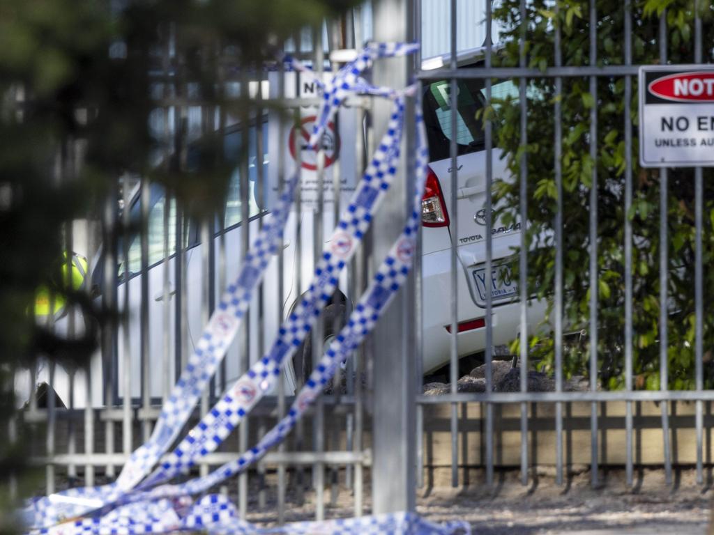 Police tape at the gate where the car came to a stop. Picture: Wayne Taylor