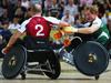 LONDON, ENGLAND - SEPTEMBER 12:  Prince Harry of Invictus is challenged by Mike Tindall of Endeavour during the Jaguar Land Rover Exhibition Wheelchair Rugby Match during day 2 of the Invictus Games, presented by Jaguar Land Rover at the Copper Box Arena on September 12, 2014 in London, England.  (Photo by Paul Thomas/Getty Images for Jaguar Land Rover)