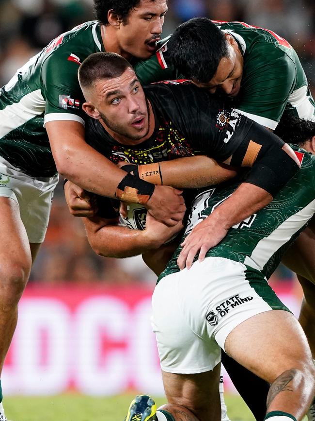 Zac Saddler is tackled during the Indigenous All Stars game v Maori Kiwis match. Picture: AAP