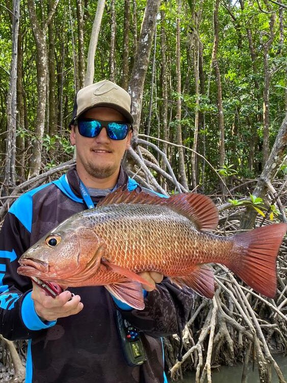 Dylan Rogers with a solid mangrove jack. Picture: Robert Erskine