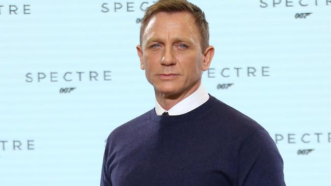 Daniel Craig poses for photographers at the announcement for the 24th Bond film.