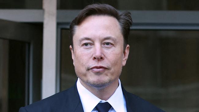 SAN FRANCISCO, CALIFORNIA - JANUARY 24: Tesla CEO Elon Musk leaves the Phillip Burton Federal Building on January 24, 2023 in San Francisco, California. Musk testified at a trial regarding a lawsuit that has investors suing Tesla and Musk over his August 2018 tweets saying he was taking Tesla private with funding that he had secured. The tweet was found to be false and cost shareholders billions of dollars when Tesla's stock price began to fluctuate wildly allegedly based on the tweet.   Justin Sullivan/Getty Images/AFP (Photo by JUSTIN SULLIVAN / GETTY IMAGES NORTH AMERICA / Getty Images via AFP)