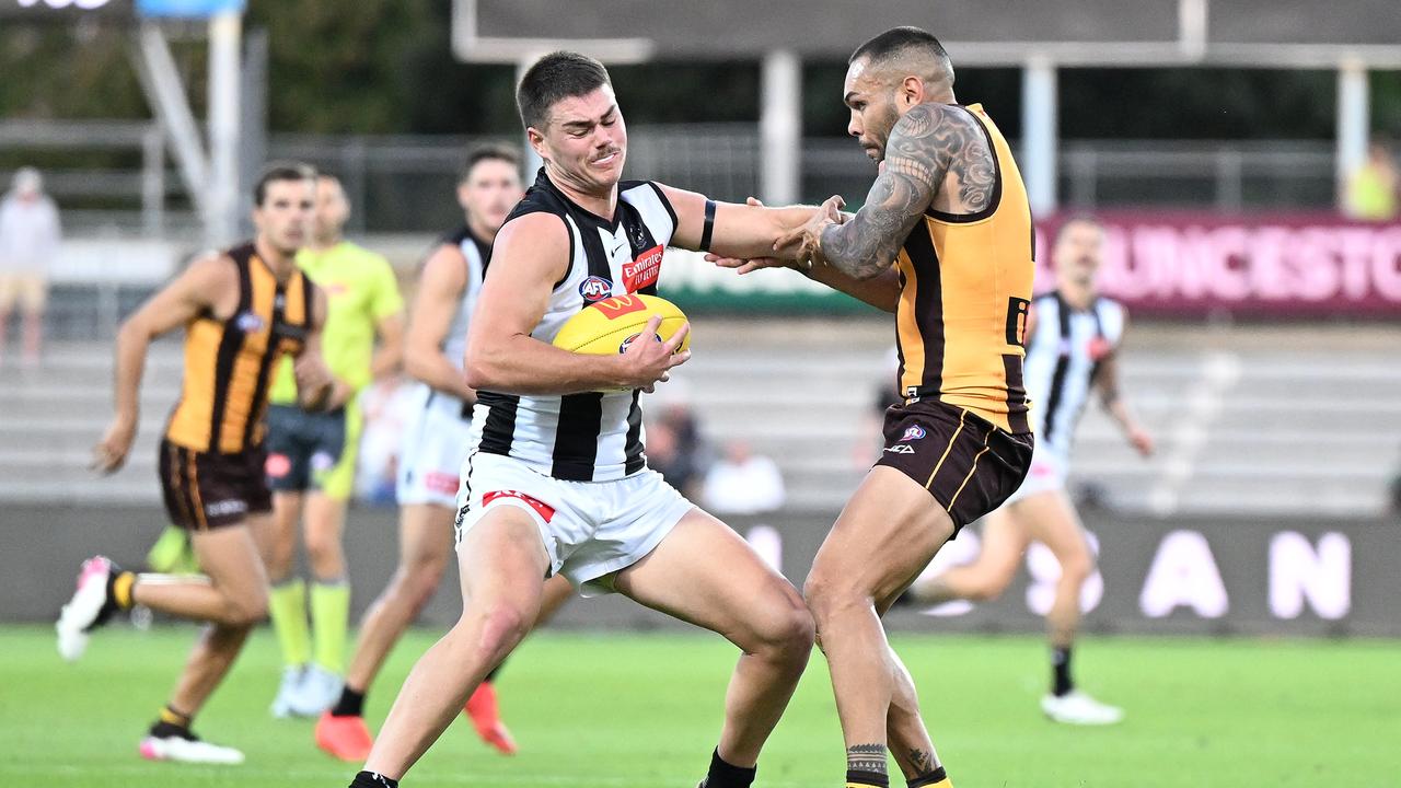 LAUNCESTON, AUSTRALIA - MARCH 02: Josh Carmichael of the Magpies is tackled by Jarman Impey of the Hawks during the AFL practice match between the Hawthorn Hawks and the Collingwood Magpies at University of Tasmania Stadium on March 02, 2023 in Launceston, Australia. (Photo by Steve Bell/Getty Images)