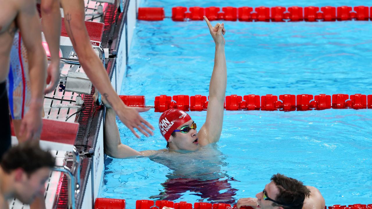 Pan Zhanle of Team People's Republic of China celebrates after winning gold in the Men's 4x100m Medley Relay Fina.