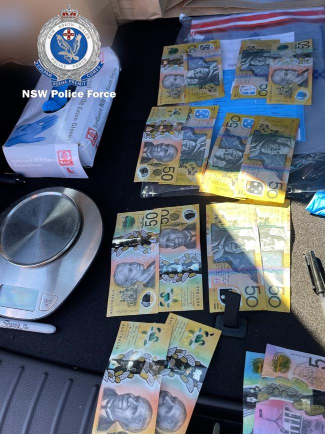 Cash, drugs and weapons were seized