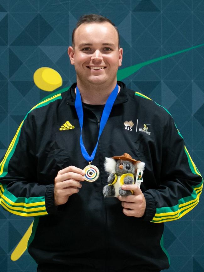 Paul Adams with a gold medal