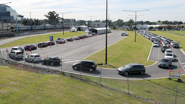 Cars line up at the Covid testing site in Dandenong today. Picture: David Crosling