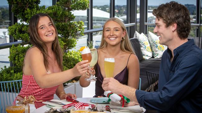 Eliza Duncan, Mimi Stanbury and Charlie Gibson celebrating Christmas at 2KW Bar. Picture: Emma Brasier