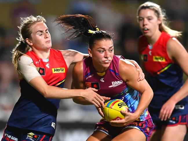 IPSWICH, AUSTRALIA - NOVEMBER 04: Poppy Boltz of the Lions is tackled during the round 10 AFLW match between Brisbane Lions and Melbourne Demons at Brighton Homes Arena, on November 04, 2023, in Ipswich, Australia. (Photo by Albert Perez/Getty Images)