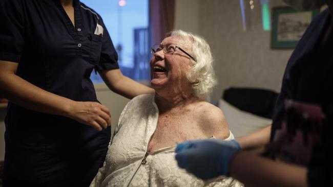 Auslag Westling, a resident at one of Attendo's nursing homes in Gothenburg, receives her first dose of the Pfizer-BioNtech Covid-19 vaccine on January 7, 2021.