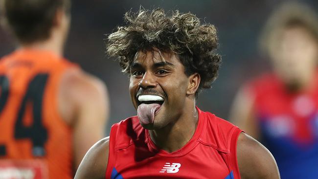 CANBERRA, AUSTRALIA - APRIL 04: Kysaiah Pickett of the Demons celebrates kicking a goal during the round 3 AFL match between the GWS Giants and the Melbourne Demons at Manuka Oval on April 04, 2021 in Canberra, Australia. (Photo by Mark Metcalfe/AFL Photos/via Getty Images)