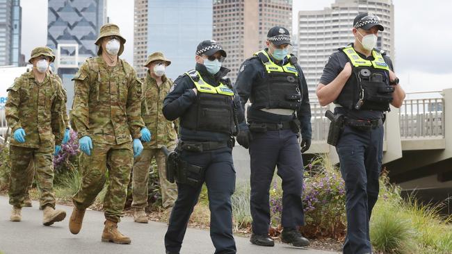 ADF and police patrol along the Yarra in Melbourne to enforce the chief health officer’s coronavirus directions. Picture: NCA NewsWire / David Crosling