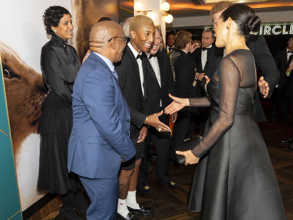 Meghan told US singer Pharrell Williams that royal life is tough. Picture: AFP