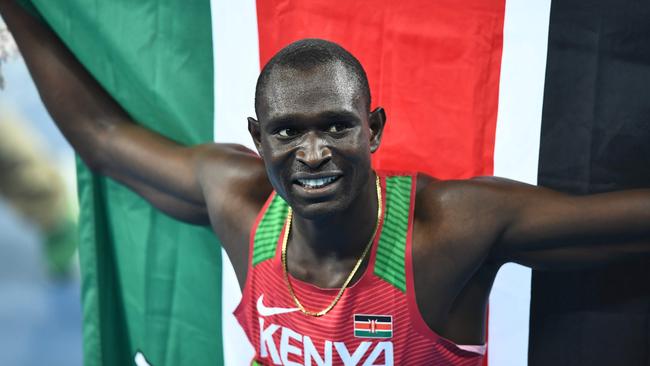 The Kenyan dynamo David Lekuta Rudisha celebrates with his nation’s flag after winning the 800m final in Rio. Picture: AFP