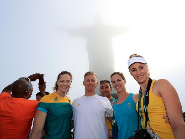 Australian swimmers Cate Campbell, Daniel Smith, Grant Irvine, Bronte Campbell and Taylor McKeown take time out to visit the Christ Redeemer high above Rio de Janeiro. Pic: Adam Head