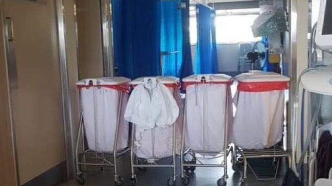 Large bins on wheels are used to section off a part of the surgical ward at Bundaberg Hospital earlier this week. The actions prompted discussion of a lockdown in the ward, which the hospital has denied.