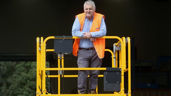 Greg Conescu at work, 30 years on for the 1987 Origin series won by Queensland. Photo: Jono Searle