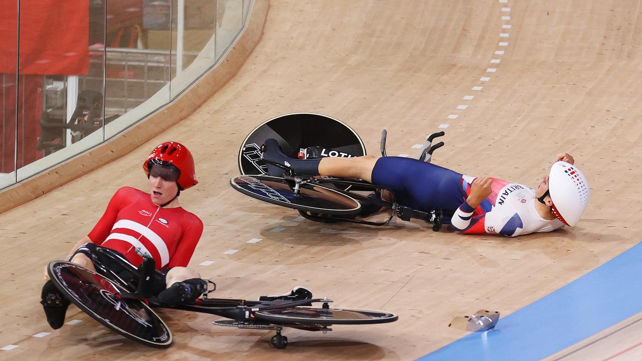 Denmark's Frederik Madsen crashes with Great Britain's Charlie Tanfield.