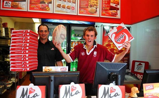 Pizza Hut franchisee Andrew Hamilton and Matthew Dugmore are all ready for Origin fever. Picture: Scottie Simonds