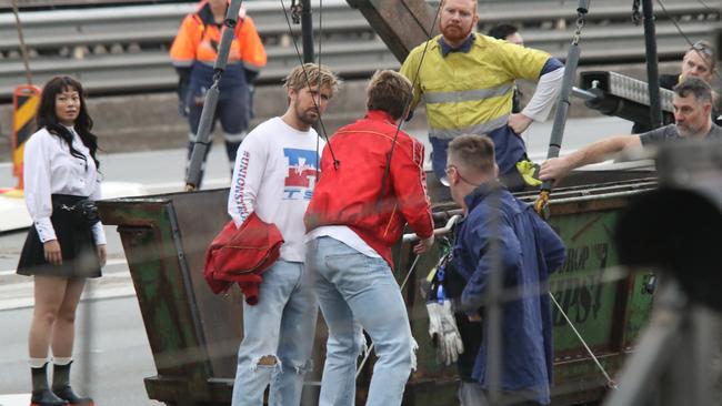 Gosling was seen talking to his stunt double on the bridge this morning. Picture: Bill Hearne