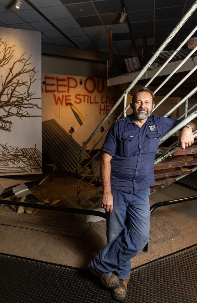 Curator of Territory History Jared Archibald at the Cyclone Tracy exhibition at MAGNT.