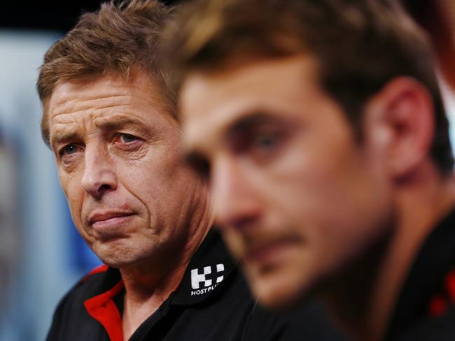 Then-Essendon assistant coach Mark thompson, pictured with Jobe Watson, said the club should come out and just keep saying it had done nothing wrong.