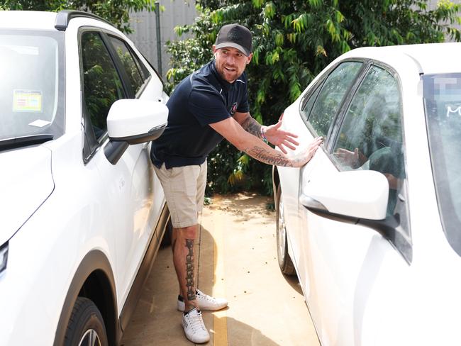 Panel beating business owner Lewis Richards shows where a car was broken into. Picture: Rohan Kelly