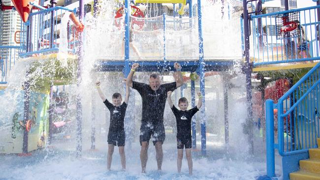 ‘Queensland’s a big place, there’s plenty to explore,’ says Gold Coast Paradise Resort guest Kevin Tart, with his sons Ollie and Finn. Picture: Russell Shakespeare