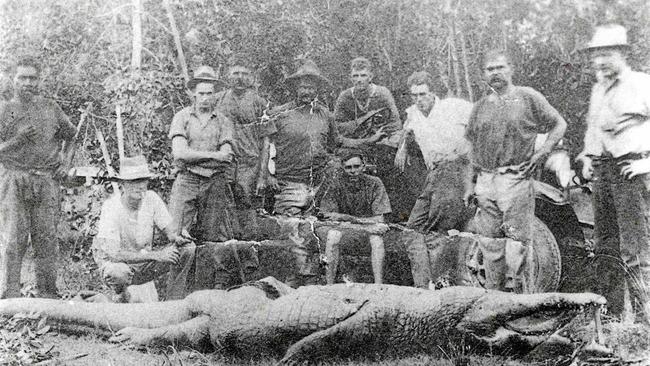 MACKAY CROC: Posing with the crocodile that killed two young girls on their way to school are from left, Fred Murray, G. Gallagher, T. Biggs, Ted Zunker, Bill Adams, R. Pearce (sitting), P. Butterwirth, Bill Schofield, Ted Rennels and Mr Patterson. 1933. Photo Daily Mercury Archives. Picture: Daily Mercury Archives