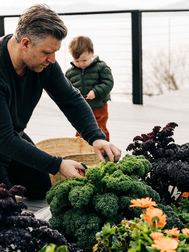 Mele and his little helper choosing the fresh produce.