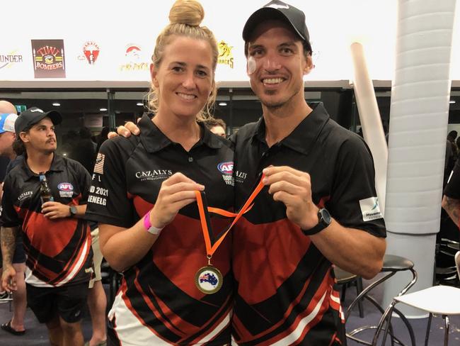 Nightcliff champion Cameron Ilett and Mickayla Ward show off the Australia Day Medal. Picture: