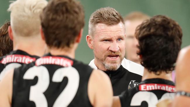 Nathan Buckley addresses his players.