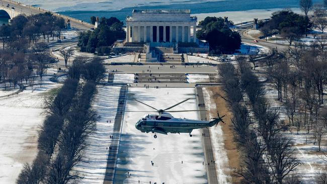 A helicopter carrying former president Joe Biden flies over the Lincoln Memorial following the inauguration ceremony of Donald Trump as the 47th US President. Picture: AFP