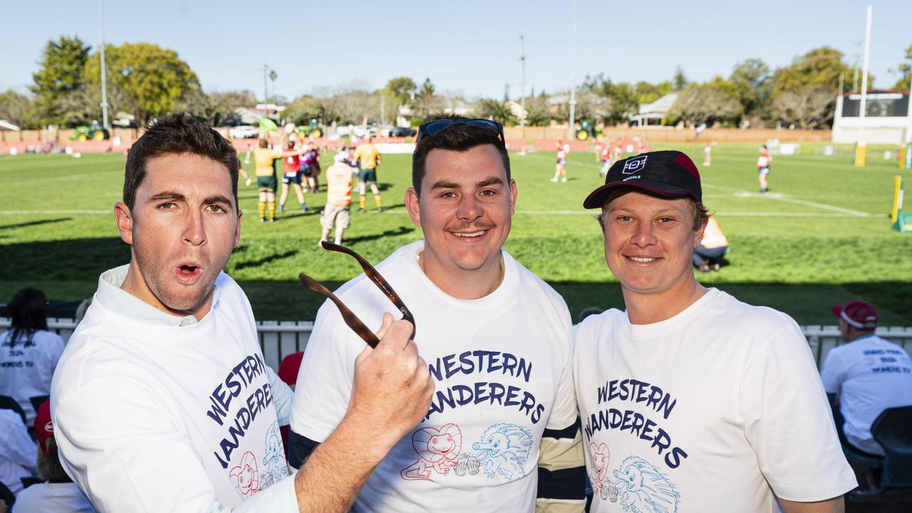 Backing the Western Wanderers (St George Roma) in the woman's rugby are (from left) Jake Robinson, Blake Walton and Alex Coonan on Downs Rugby grand final day at Toowoomba Sports Ground, Saturday, August 24, 2024. Picture: Kevin Farmer