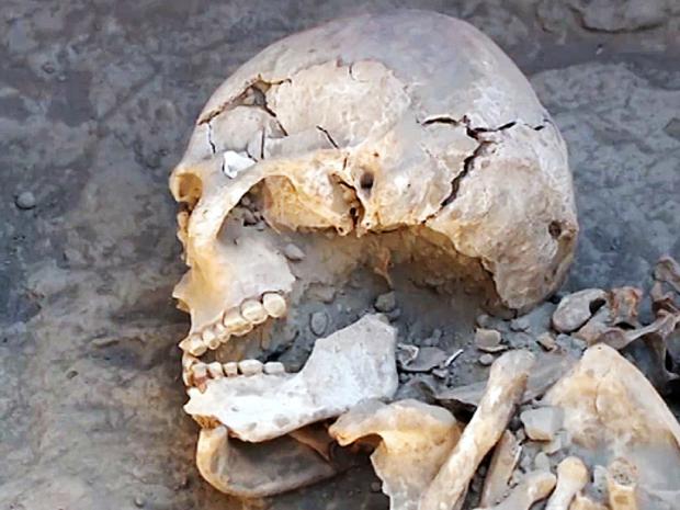 Pic shows: The remains found. The remains of an ancient female warrior have been discovered in South Kazakhstan proving for the first time it was not just men who were soldiers. The perfectly preserved skeleton was found with a huge sword and dagger and archaeologists believe the woman lived in the period between 11 century BC and IV century AD . Previously, no records have ever been found of woman warriors in the area and experts believe she was a citizen of importance living in the ancient Kanguy state. She probably led a group of nomads who lived somewhere in the area of modern Kazakhstan . Scientists discovered the sex of the human remains by closely examining the skull which they say is typically female. Researchers also found some ancient arrows, a small knife placed close to the right hand of the female warrior and a sword placed close to her left hand indicating that the person was a renown warrior. Also buried with her were a number of pots and bowls which showed that the person was both wealthy and important. The major find is one of the most notable ever made after 23 years of research in the area. The items will be soon be exhibited in the National Museum of Kazakhstan while scientists continue their work in the region. (starts)